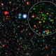 Illustration for article titled Ancient galaxies defy convention, crank out stars well into their old age